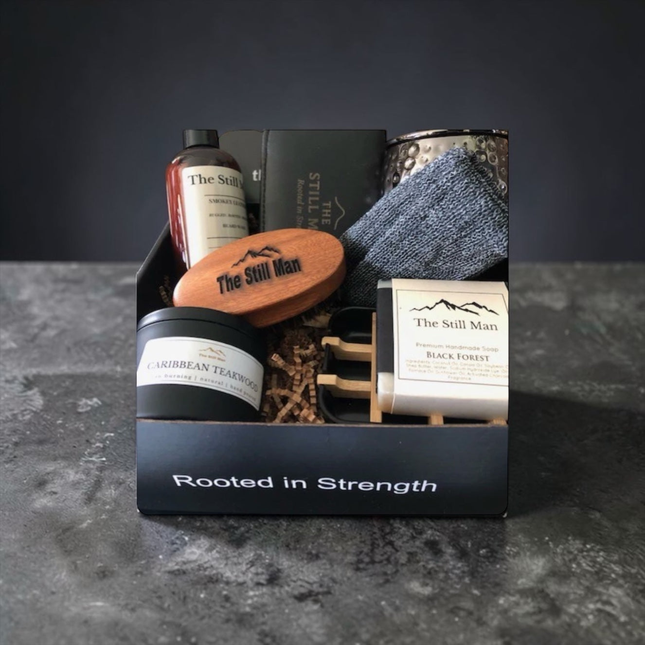 Still Man Signature Box contents — beard brush, mug, soap bar, and grooming essentials